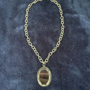 Silver tone necklace with pendant